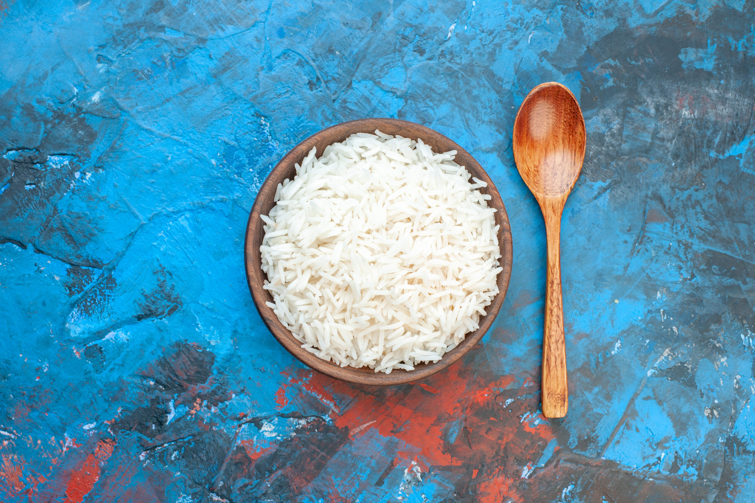 top-view-of-tasty-rice-meal-in-a-brown-small-pot-a-2025-02-10-11-48-10-utc